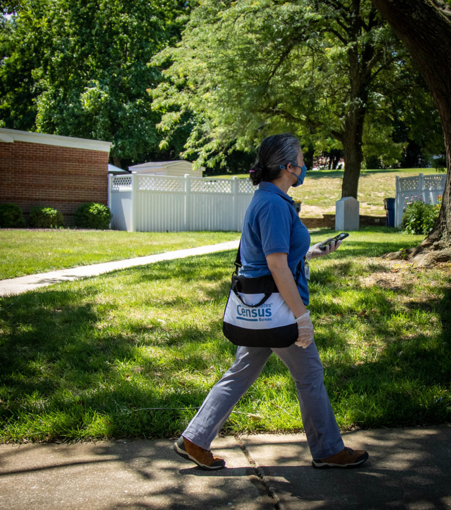Census worker walking