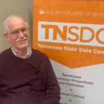 Gregg Robinson in front of the TNSDC sign